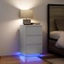Spintelė prie lovos su LED lemputėmis Balta 38x34x65 cm